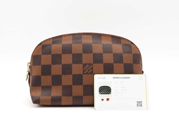 Louis Vuitton Cosmetic Pouch In Damier Ebene Coated Canvas Fw0125orxsa