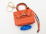 Mini Barkin Doggie Waste Bag Dispenser Charm In Orange Fw1025cdu