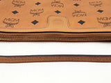 Mcm Stark Wristlet Pouch In Cognac Visetos Coated Canvas Fw0425lrzdu