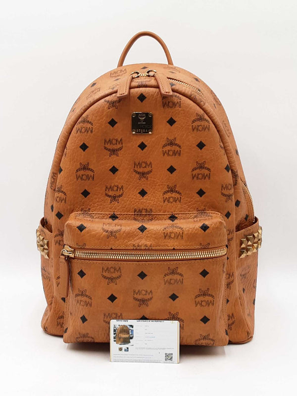 Mcm Stark Side Studs Backpack In Cognac Visetos Coated Canvas Fw0825ozxdu
