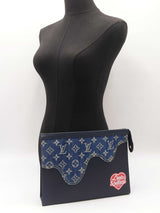 Louis Vuitton X Nigo Pochette Voyage Mm In Monogram Drip Leather Fw0226ixzdu