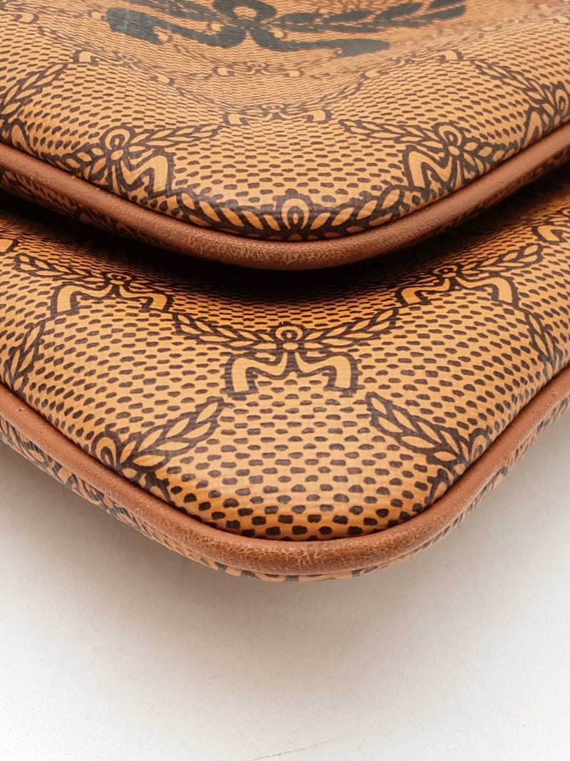 Mcm Himmell Triangle Pouch In Cognac Lauretos Coated Canvas Fw0725crdu