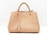 Louis Vuitton Montaigne Handbag In Beige Monogram Empreinte Leather Fw0926cexdu