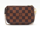 Louis Vuitton Mini Pochette Accessoire In Damier Ebene Coated Canvas Fw1225ozxdu