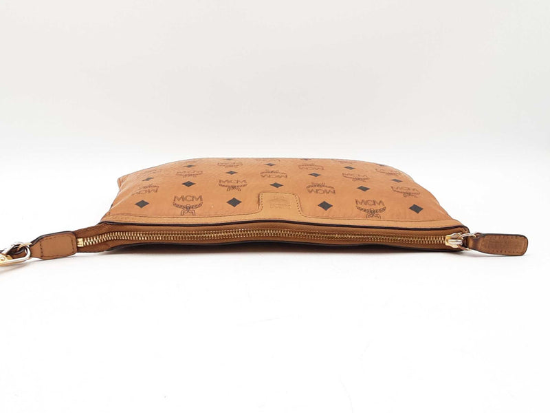 Mcm Stark Wristlet Pouch In Cognac Visetos Coated Canvas Fw0425lrzdu