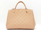 Louis Vuitton Montaigne Handbag In Beige Monogram Empreinte Leather Fw0926cexdu