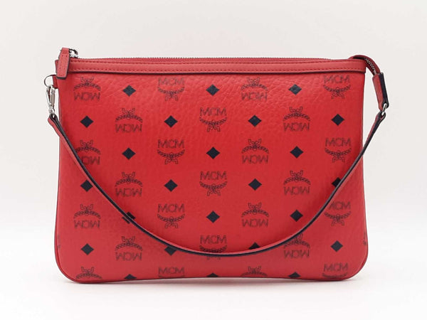 MCM レッドレザー クラッチバッグ Mcm Zip Top Pouch In Ruby Red Visetos Coated Canvas Fw1215lprdu