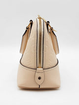 Louis Vuitton Neo Alma Bb Bag In Cream Monogram Empreinte Leather Fw0626cxzdu