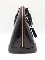Louis Vuitton Alma Pm Handbag In Monogram-embossed Amarante Vernis Fw0426pxzdu