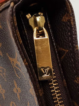 Louis Vuitton Looping Mm Bag In Monogram Coated Canvas  Fw0425icrdu