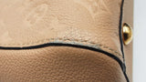 Louis Vuitton Montaigne Handbag In Beige Monogram Empreinte Leather Fw0926cexdu