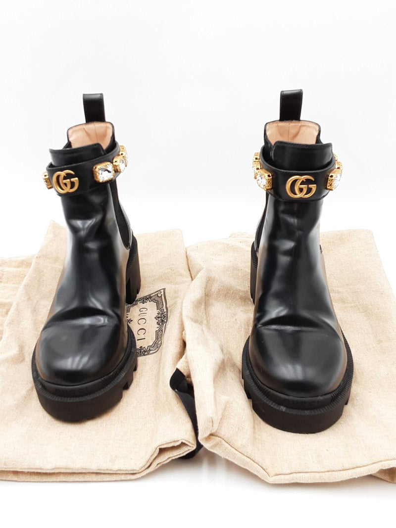 Gucci leather boots with buckle best sale