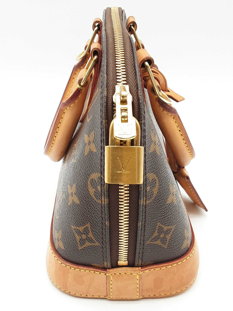 Louis Vuitton Alma Brown Monogram Coated Canvas Crossbody Bag Do0125wxzde