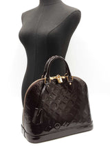 Louis Vuitton Alma Pm In Amarante Monogram-embossed Vernis Leather Fw0226rxzdu