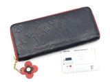 Louis Vuitton Blooming Flower Clemence Wallet In Navy Blue Monogram Empreinte Leather Fw0726lwrdu