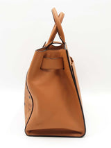 Mcm Essential Medium Tote Bag In Cognac Visetos Coated Canvas Fw0525ozxdu