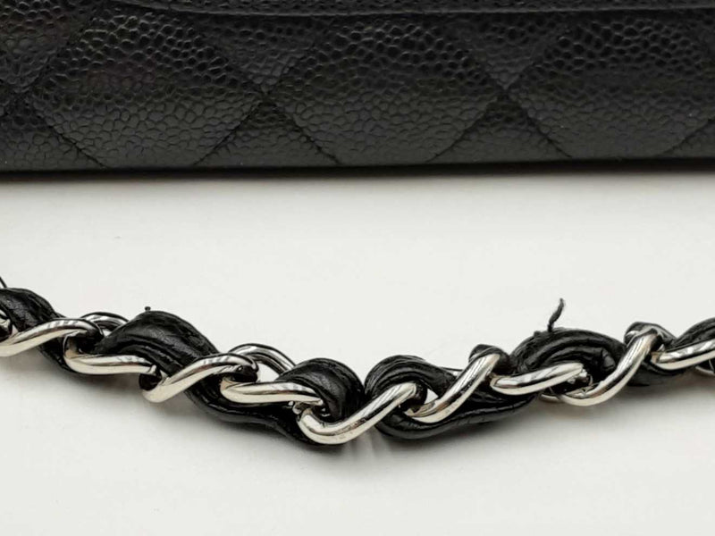 Chanel Maxi Double Flap Black Caviar Leather Handbag Fw1224orxzdu